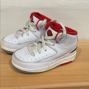 Kids White and Red Nike Shoes
